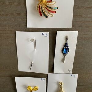 Elegant vintage brooch set of 5pcs in gold and silver tones.